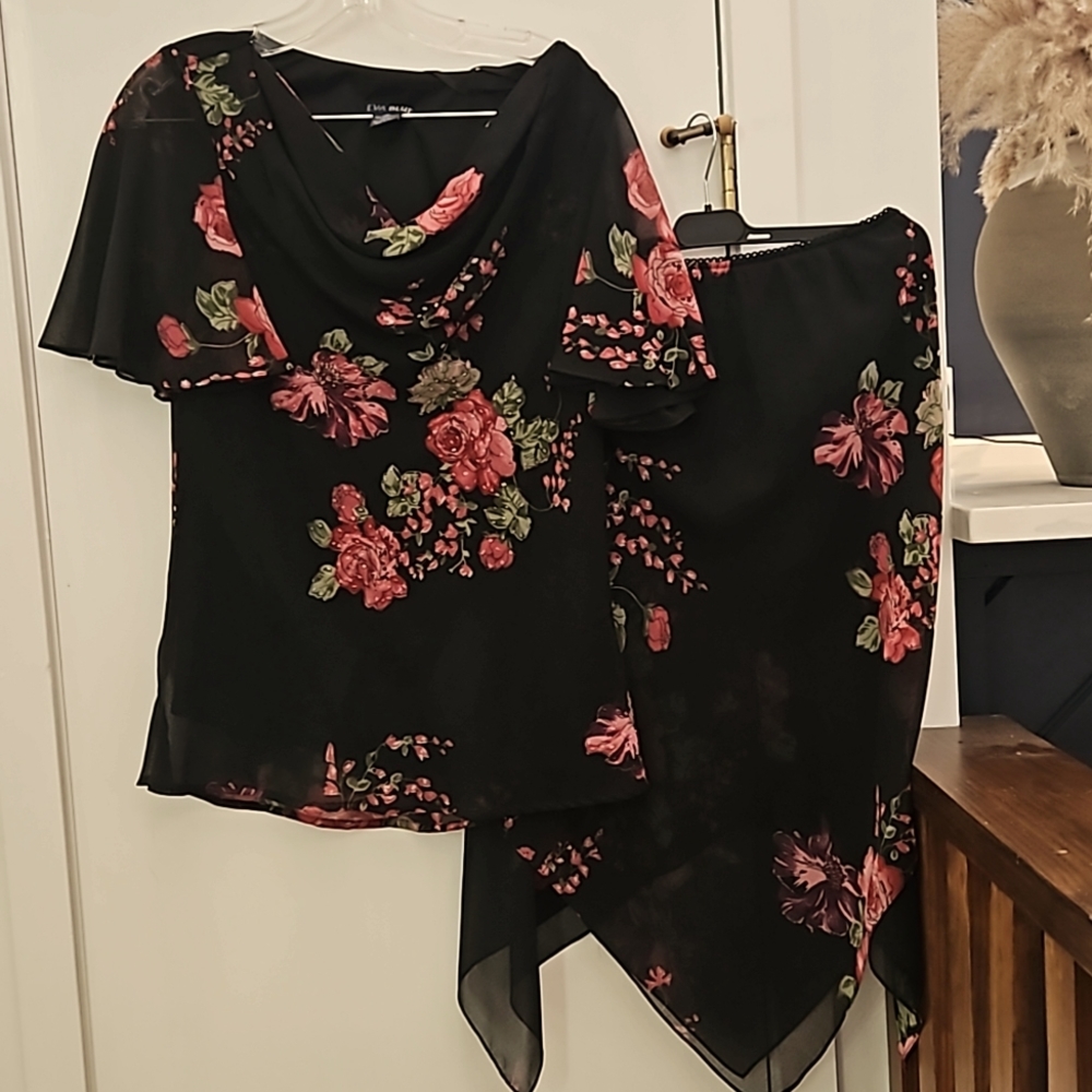 Eva blue size 10 handkerchief style skirt black and rose dress